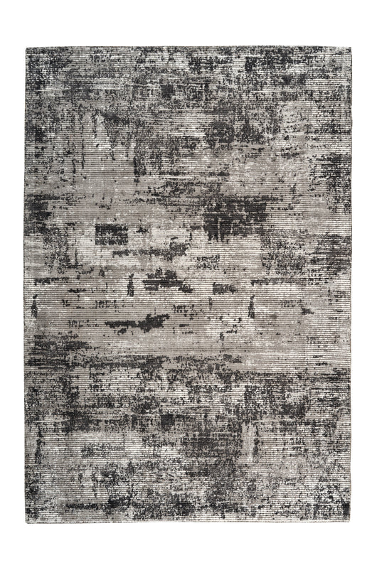 Ein vielseitiger Design Teppich, der mit seinem ausdrucksstarken Print-Muster zum Highlight in jedem Wohnraum wird.