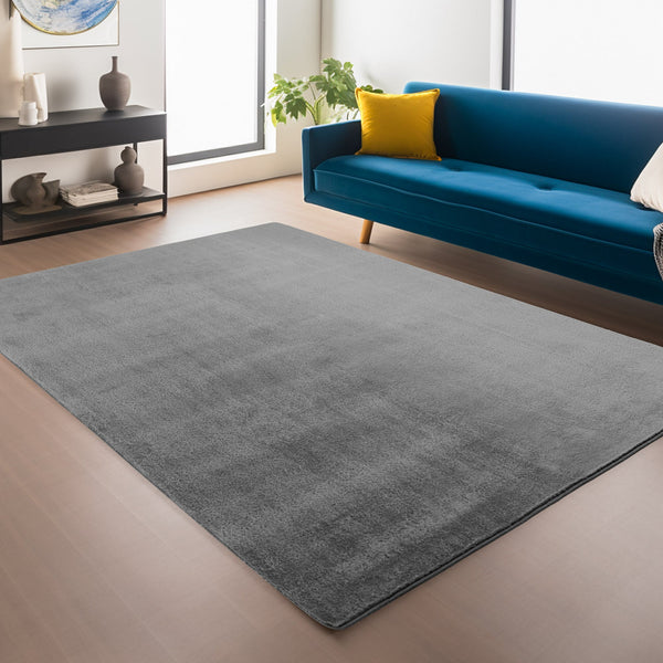 Moderner Teppich Wohnzimmer Grau: Verleihen Sie Ihrem Raum zeitlose Eleganz mit diesem stilvollen, grauen Kurzflor-Teppich.