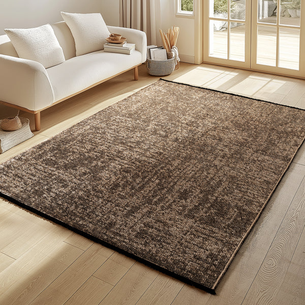Ein weicher Teppich fürs Wohnzimmer mit elegantem Boho-Muster – perfekt für stilvolle und gemütliche Wohnräume.