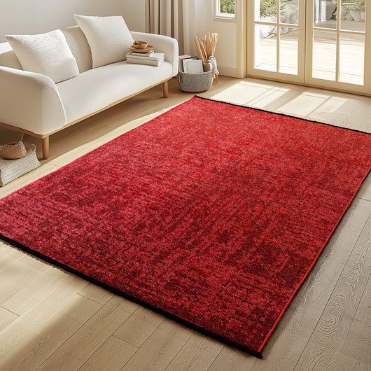 Ein moderner Teppich fürs Wohnzimmer verleiht dem Raum eine warme und einladende Atmosphäre. Das minimalistische Design passt perfekt zu zeitgemäßen Einrichtungen.