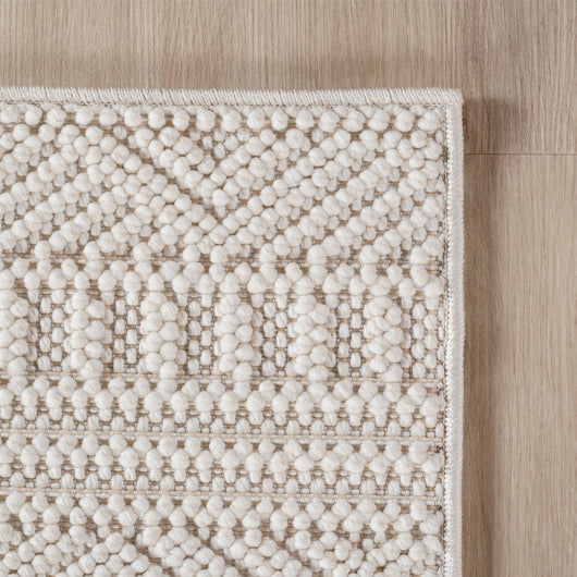 Hypoallergener Kurzflor mit dichter Webung: Ein hypoallergener Kurzflor mit dichter Webung (1.600 g/m²). Schlichtes Design und pflegeleichte Handhabung in Creme-Tönen.

