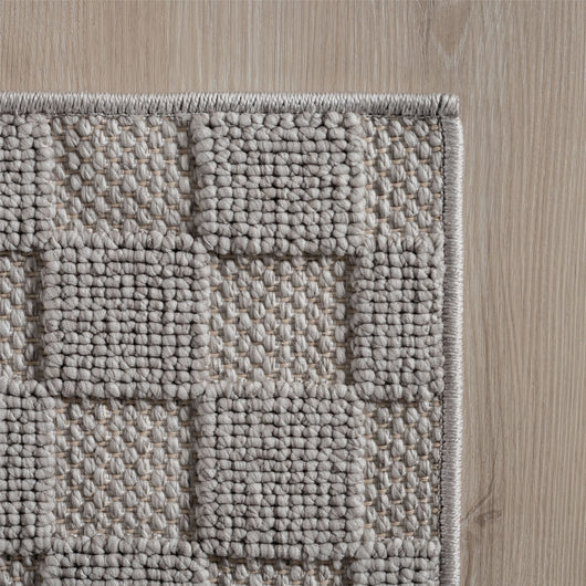 Extrem Strapazierfähiger Teppich in Sandtönen: Dieser extrem strapazierfähige Teppich in Sandtönen (Beige, Creme) hält jeder Belastung stand. Er ist maschinell gefertigt und äußerst robust für stark frequentierte Bereiche wie den Flur.

