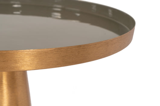 Dieser runde Tisch aus Metall ist nicht nur stilvoll, sondern auch dank seiner glatten Oberfläche besonders pflegeleicht.