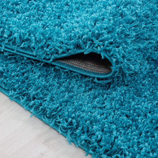 Hochflor Teppich Türkis für Wohnzimmer | Komfort & Stil mit Jute Rücken 4000- Product vendor