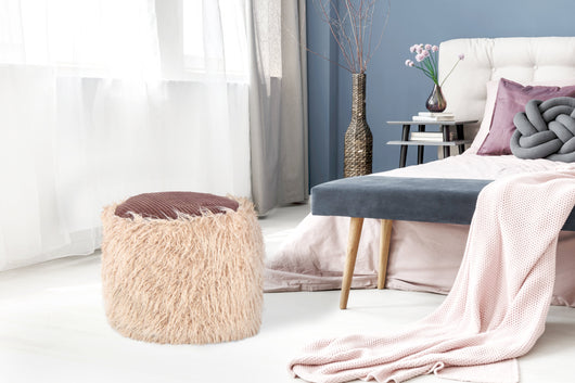 Fellpouf Beige Braun: Schaffen Sie mit diesem kuscheligen und strapazierfähigen Sitzmöbel Ihre ganz persönliche Wohlfühloase.