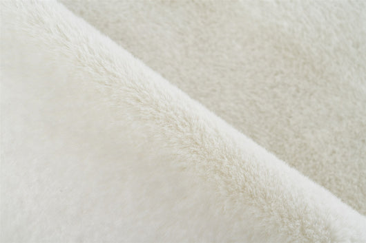 Design Badematte rund weiß: Moderne Eleganz, die Ihr Bad aufwertet.