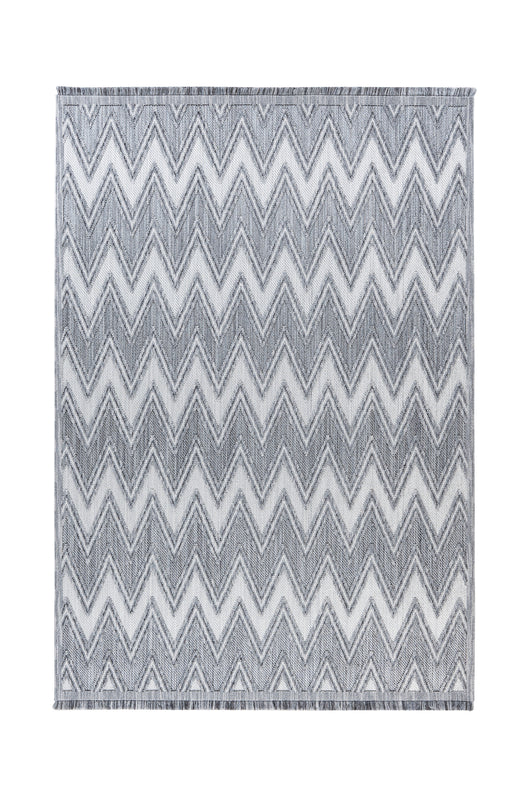 Teppich in Grau-Weiß mit grafischem Muster – perfekt für skandinavisches Wohndesign.