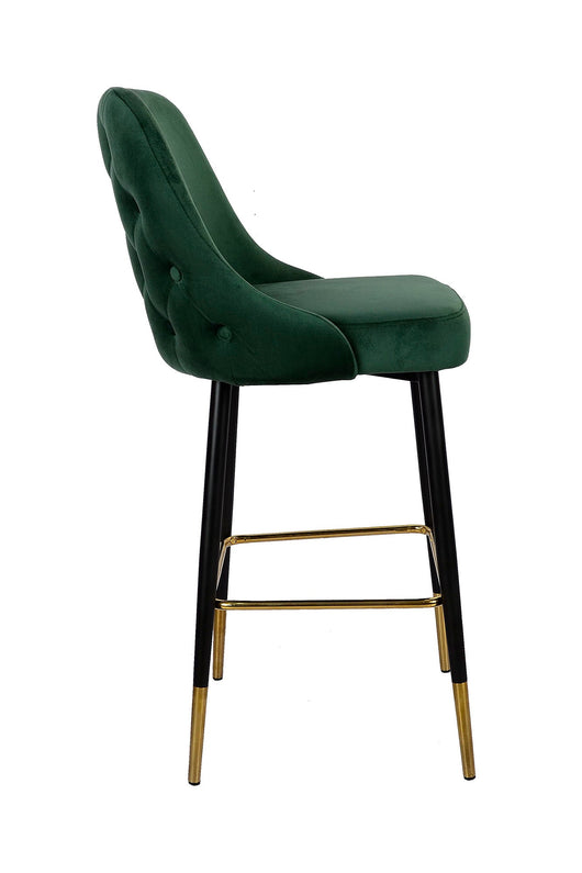 Dieser Designer Barhocker in Grün vereint zeitloses Design mit maximalem Komfort durch die bequeme Polsterung und praktische Fußstütze.