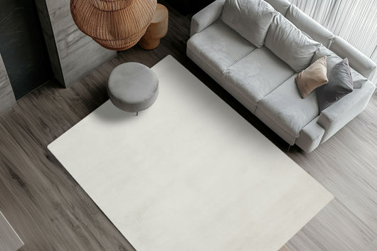 Dekoratives Statement: Der Teppich ist das perfekte, weiche Accessoire, das den Komfort und Stil im Wohnzimmer oder Schlafzimmer aufwertet.