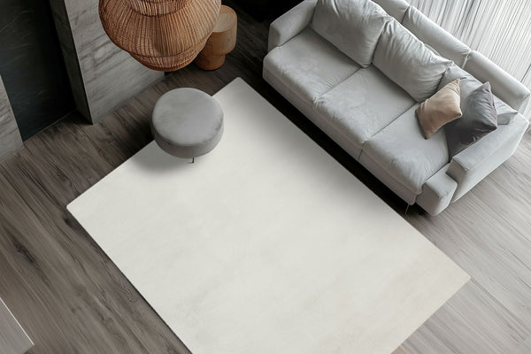 Dekoratives Statement: Der Teppich ist das perfekte, weiche Accessoire, das den Komfort und Stil im Wohnzimmer oder Schlafzimmer aufwertet.