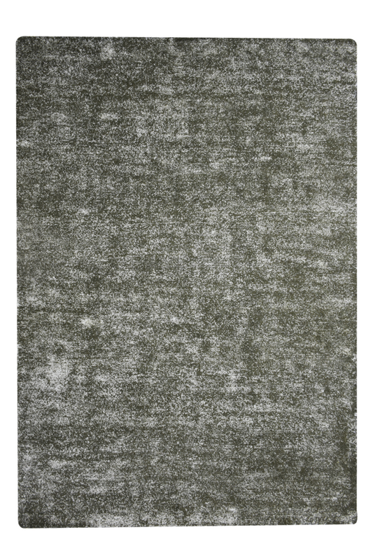 Ein dekorativer Vintage-Teppich, der mit seinem dezenten Design Ihre Räume optisch aufwertet.