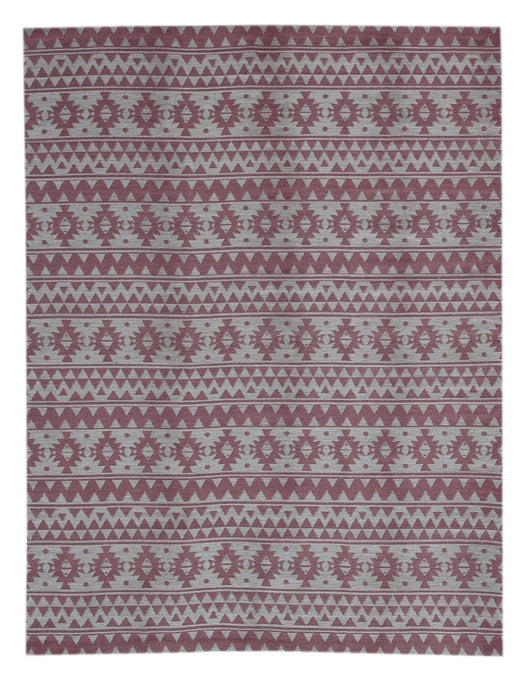 Der wetterbeständige "Sunny 210 Pink" ist ideal als robuster Flur-Teppich oder dekorativer Terrassenteppich. Das grafische Ethno-Muster verleiht ihm einen einzigartigen Look. Gefertigt aus pflegeleichtem Polyester und handgetuftet, bietet er beste Qualität für den Dauereinsatz. Er ist unempfindlich gegenüber Witterung und kann auf Fußbodenheizungen genutzt werden.


