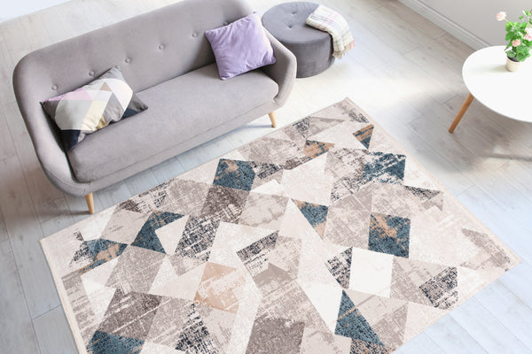 Dieser stilvolle Wohnzimmer Teppich in Grau/Blau bringt Vintage-Charme und Gemütlichkeit in Ihr Zuhause.