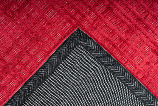 Der ideale Wohnzimmerteppich: Karma 125 Cherry – schafft Harmonie und ist auch für Fußbodenheizung geeignet.