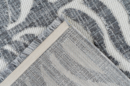 Ein Must-have für Ihr Zuhause: Dieser Teppich Grau Kurzflor in Anthrazit-Tönen bietet hohen Komfort und zeitlose Eleganz.