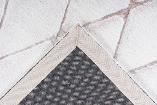 Stabile Rückseite: Ausgestattet mit einem Rücken aus 100% Baumwolle, der den Flor zusätzlich verstärkt.

