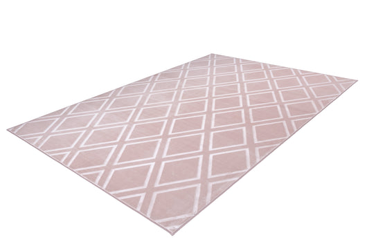 Detailansicht des hochwertigen Teppichs Monroe 325 in Rosa, der mit seiner Relief-Struktur und der besonders weichen Haptik wie echtes Kaninchenfell jeden Raum aufwertet.